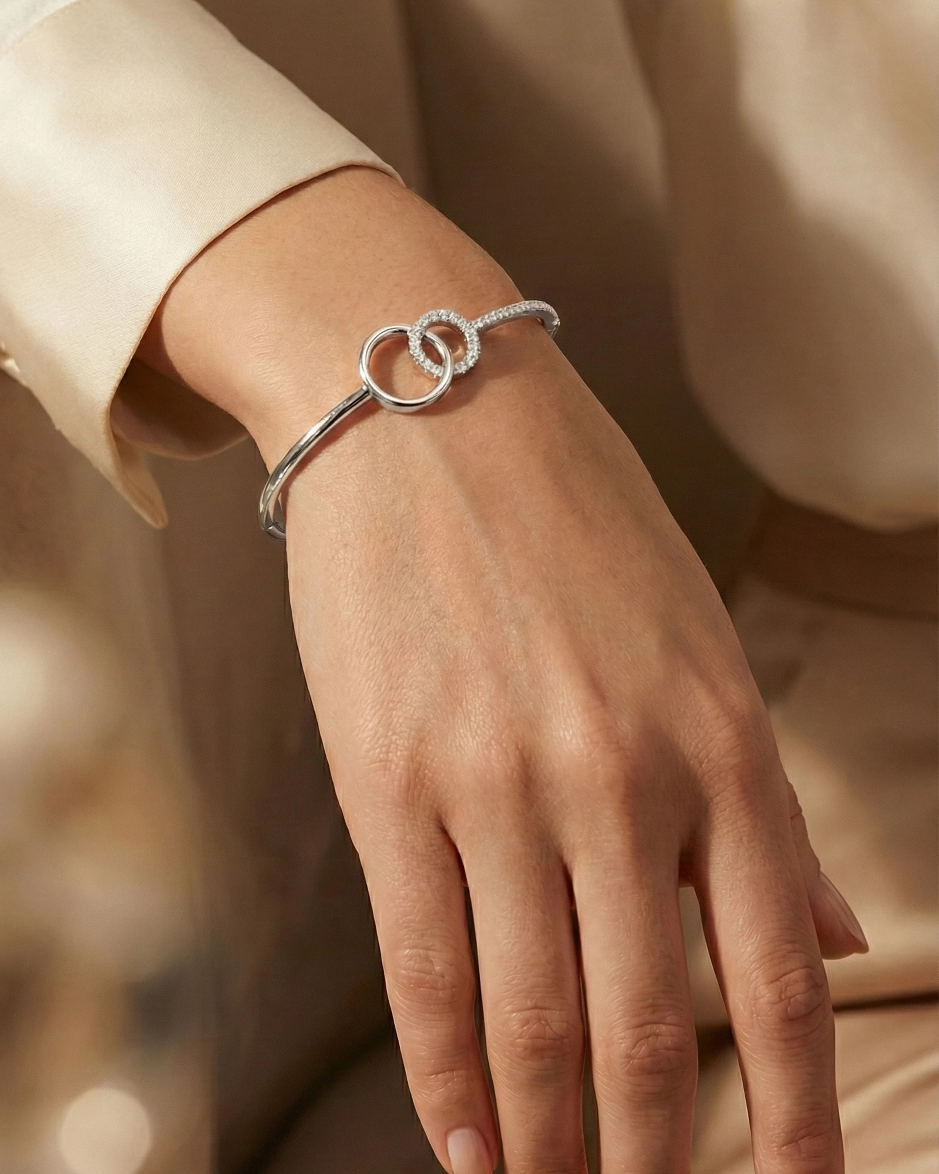 Entwined Unity Halo Bangle – 925 Sterling Silver — model