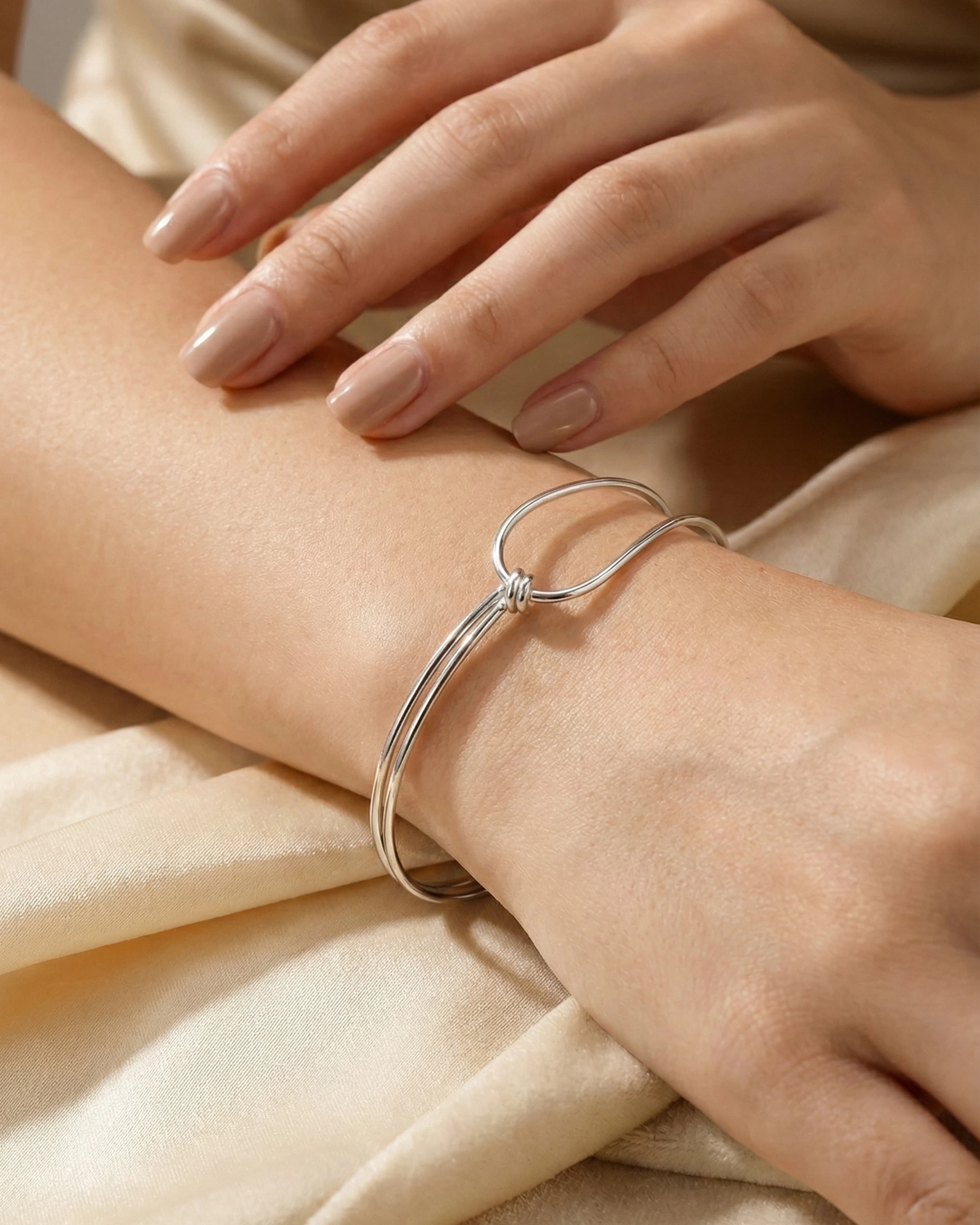 Infinity Knot Minimalist Bangle – 925 Sterling Silver — model